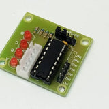 ULN2003 Stepper Motor Driver Board For Arduino Avr SMD - a green circuit board with four red LEDs, a white connector, and an integrated circuit.