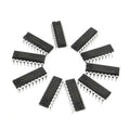 ULN2803 ULN2803A ULN2803A IC - a circular arrangement of nine black, rectangular 18-pin integrated circuit chips with silver metal pins on a white background.
