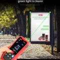 UNI-T LM100G Green Laser Distance Meter – 100 m, ±(2 mm+5×10⁻⁵·D), 515 nm Green Beam, Area / Volume / Pythagoras, Angle Sensor, 2.4" EBTN Display, Rechargeable - a red casing, buttons, and a screen displaying measurements, projecting a green laser beam.