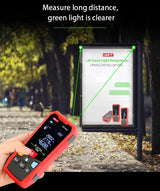 UNI-T LM100G Green Laser Distance Meter – 100 m, ±(2 mm+5×10⁻⁵·D), 515 nm Green Beam, Area / Volume / Pythagoras, Angle Sensor, 2.4" EBTN Display, Rechargeable - a red casing, buttons, and a screen displaying measurements, projecting a green laser beam.