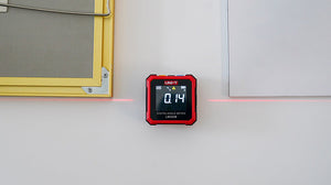 UNI-T LM320B Digital Laser Angle Meter – 4×90° Inclinometer, ±0.2° Accuracy, 0.01° Resolution, Two-Side Lasers, Four-Side Magnetic Base, EBTN Display, Type-C Rechargeable - a red and black square device on a wall, showing 0.14 on its screen with a horizontal red laser line.