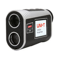 UNI-T LM600A Laser Rangefinder – 600 m, 6× Monocular, Golf & Hunting, Flagpole Lock, Slope / Speed / Angle, ±1 m - silver and black, featuring two circular lenses on the front and a side label displaying the brand and model name.