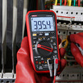 UNI-T UT18B MAX True RMS Digital Multimeter – 6000 Count, 1000V AC/DC, VFD, Temperature, LED Test, Capacitance, Frequency, EMI Protection with Gold-Plated Leads - a red casing, a rotary dial, two test leads, and a display reading 395.4.
