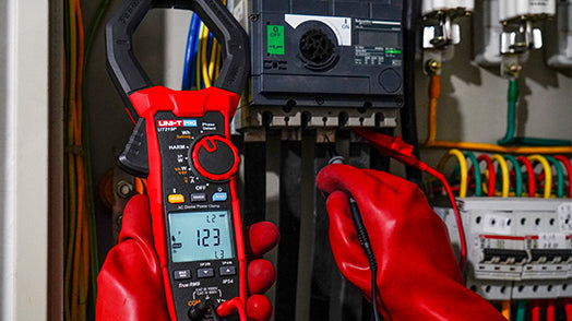 UNI-T UT219P AC Digital Power Clamp Meter – 1000A AC, 1000V, 3-Phase Power up to 3000kW, Harmonics/THD, Power Factor, Phase Sequence, True RMS, Bluetooth 5.0, 75mm Jaw, IP54, CAT IV 600V - a black body, red accents, a rotary dial, and a screen displaying 123.