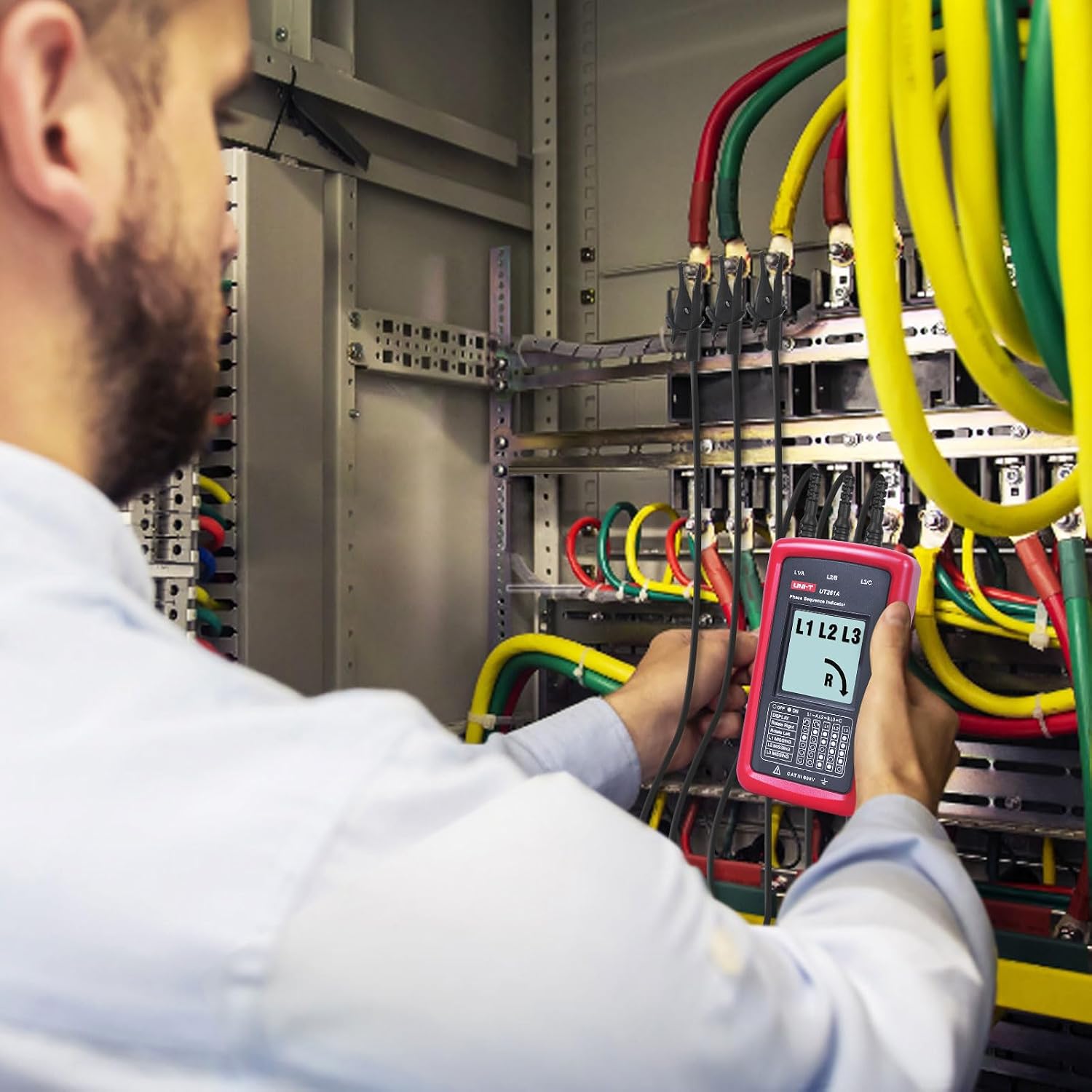UNI-T UT261A 3-Phase Sequence Indicator – LCD Display, Missing-Phase Detection, AC 90–600V, No Battery Required - an LCD screen with L1, L2, L3, and an R arrow icon, connected to electrical wires.
