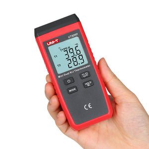 UNI-T UT320D Dual-Channel Mini Contact Thermometer – K/J Thermocouple, −50°C to 1300°C, T1/T2/T1-T2 Differential, MAX/MIN/AVG, Data Hold, Backlit, 1m Drop-Proof - held in a hand, showing a red and grey handheld device with a digital display reading 39.6 and 28.9, buttons, and CE mark.