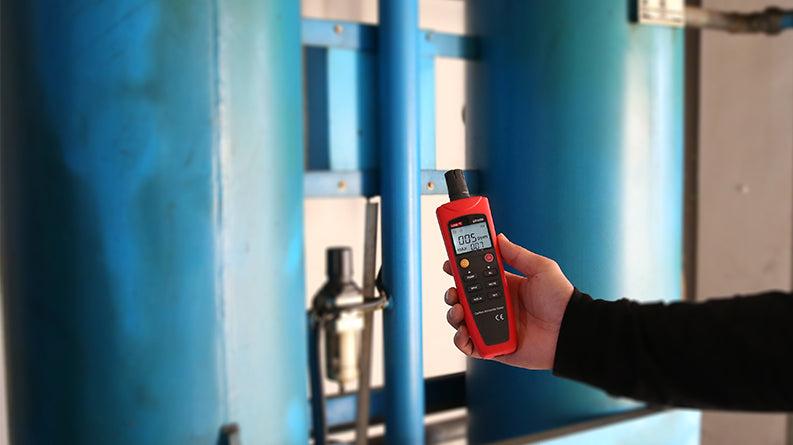 UNI-T UT337A Carbon Monoxide (CO) Meter Gas Detector – 0–1000 PPM, Electrochemical Sensor, Audio-Visual Alarm, Data Hold, Backlit LCD - a red handheld device with a black sensor head, buttons, and a screen displaying 005 PPM.