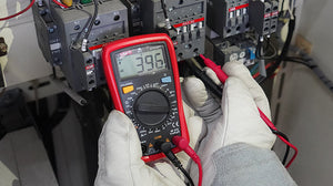 UNI-T UT33D+ Palm Size Digital Multimeter – 2000 Count, AC/DC Voltage & Current, NCV Non-Contact Detection, Resistance, Diode, CAT II 600V, 2m Drop-Proof - with a red casing, rotary dial, and LCD screen displaying 396, held by gloved hands testing electrical wiring.