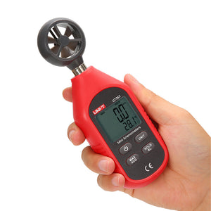 UNI-T UT363 Mini Anemometer Wind Speed Meter – 0–30 m/s, Temperature −10°C to 50°C, ±(5%+0.5), MAX/AVG, Backlit LCD, Compact Handheld - a red handheld device with a fan top, LCD screen reading 0.0 m/s and 28.1°C, and four control buttons.