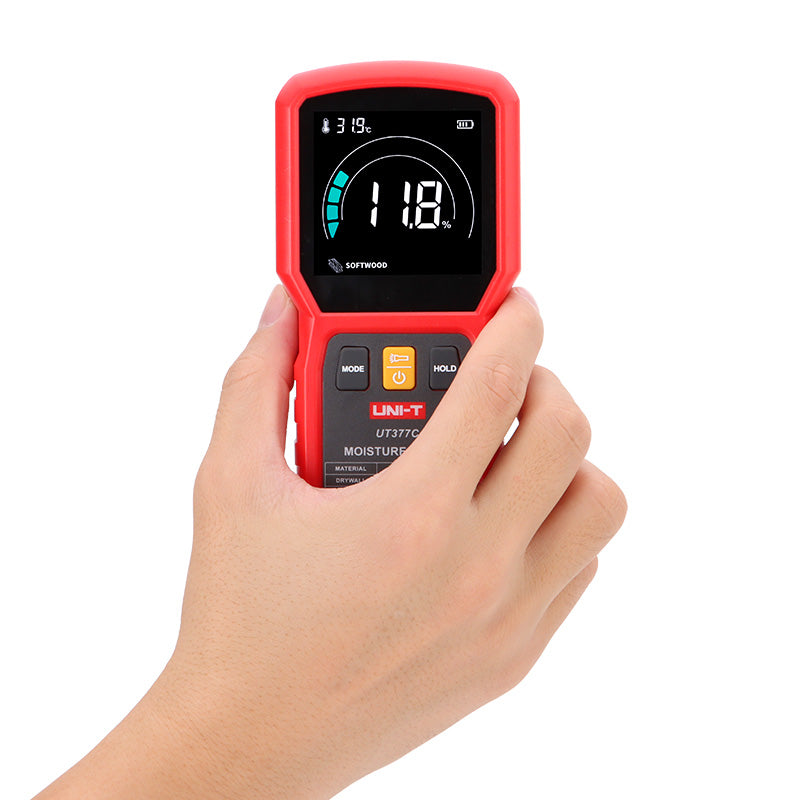 UNI-T UT377C Pinless Moisture Meter – Non-Destructive, Softwood / Hardwood / Drywall / Masonry, 50×50 mm Sensor, EBTN Colour Screen, Temp, Flashlight - held in a hand, featuring a red casing, three front buttons, and an EBTN screen displaying 11.8% moisture and 31.9°C.