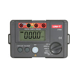 UNI-T UT522 Earth Resistance Tester – Digital Earth / Ground Resistance Meter - a grey digital device with a central LCD showing 000.0 V~, input ports, function dial, and control buttons.