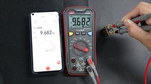 UNI-T UT60BT Bluetooth True RMS Digital Multimeter – 9999 Count, AC/DC 1000V, 10A, Wireless Data Logging via App, IP54, Temperature, NCV, CAT III 600V - measuring a 9V battery with a 9.682V reading displayed on its screen and a connected smartphone app.