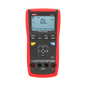 UNI-T UT612 Digital LCR Meter – 20000 Count, 100Hz–100kHz, L/C/R/DCR/Q/D/θ/ESR, Series/Parallel, Auto Range, USB, SMD Test Clamp, Handheld Bridge - in a red and black handheld casing, featuring a central LCD screen displaying "OL" and multiple control buttons and ports.