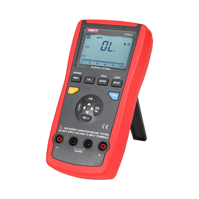 UNI-T UT612 Digital LCR Meter – 20000 Count, 100Hz–100kHz, L/C/R/DCR/Q/D/θ/ESR, Series/Parallel, Auto Range, USB, SMD Test Clamp, Handheld Bridge - in a red and black handheld casing with a stand, showing an "OL" reading on the digital display and various control buttons.