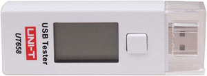 UNI-T UT658 USB Tester – 3–9V, 0–3A, 9999mAh, Voltage / Current / Capacity / Power Meter, USB Charger Doctor Detector - a white rectangular device with a blank LCD screen, a single square button, and a USB connector protected by a clear cap.