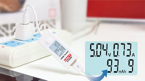 UNI-T UT658B USB Tester – 3–9V, 0–3.5A, Voltage/Current/Capacity Monitor, 0–9999mAh, 10-Set Storage, LCD, USB Power Meter - plugged into a wall charger, showing a white rectangular body with a digital LCD displaying 5.04V, 0.73A, and 93.9mAh.