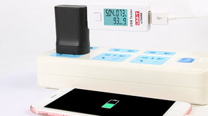 UNI-T UT658B USB Tester – 3–9V, 0–3.5A, Voltage/Current/Capacity Monitor, 0–9999mAh, 10-Set Storage, LCD, USB Power Meter - displaying 5.04V, 0.73A, and 93.9mAh while charging a smartphone.