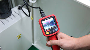 UNI-T UT665 Industrial Borescope – 2.4" TFT Screen, 9mm Camera Probe, 1m Semi-Rigid, IP67, 4 LED, Inspection Endoscope Camera - held in a hand, featuring a red handle, a 2.4-inch screen displaying a live inspection view, and control buttons.