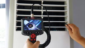 UNI-T UT665P-5M Handheld Single-Lens Industrial Borescope – 4.3" HD Screen, 8mm Lens, 5 m Replaceable Probe, IP67, 8 LED, Inspection Camera - a grey handheld unit with a 4.3" screen displaying a close-up view of an internal screw.
