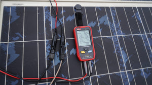 UNI-T UT673PV Solar MPPT Power Meter – 5–800W, 12–60V, 0–35A, Manual/Auto MPPT Test, Solar-Panel Powered, PV Output Tester - 16.4W, 20.6V, 0.8A, 32.6V, and 1.7A on its digital display.
