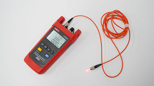 UNI-T UT693D Optical Multimeter – Fiber Power Meter (-70~10DBM, 800–1700nm) + 10mW VFL, FC/SC/ST, InGaAs, IP65, Optical Power Meter & Fault Locator - a digital screen reading -70.00 dBm at 1310nm, connected to an orange fiber optic cable with a red VFL.