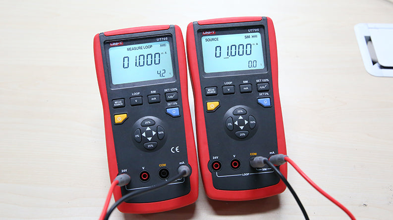 UNI-T UT705 Single-Function Loop Calibrator – 24 mA Source/Simulate, DC V/mA Measure, 24 V Loop Power, Ramp & Step - two red and black handheld devices with digital displays showing 1.000 mA, function buttons, and connected test leads.