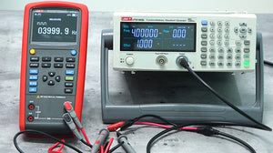 UNI-T UT715 Multifunction Loop Process Calibrator – 24mA / 24V DC, Frequency, Pulse, 24V Loop Power, 20000 Count - connected to a waveform generator, showing 03999.9 Hz on its digital display.