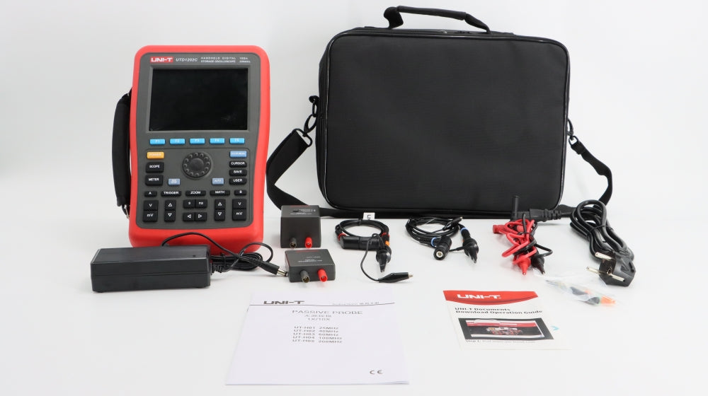 UNI-T UTD1102C 100 MHz 2-Channel Handheld Oscilloscope – 7.5 Kpts, 500MSA/S - with a red and black casing, display, control buttons, carrying bag, power adapter, probes, and accessories.