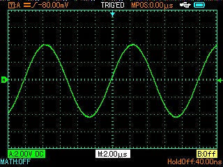 UNI-T UTD1102C 100 MHz 2-Channel Handheld Oscilloscope – 7.5 Kpts, 500MSA/S - screen displaying a green sine wave signal on a black grid background with measurement settings at the bottom.