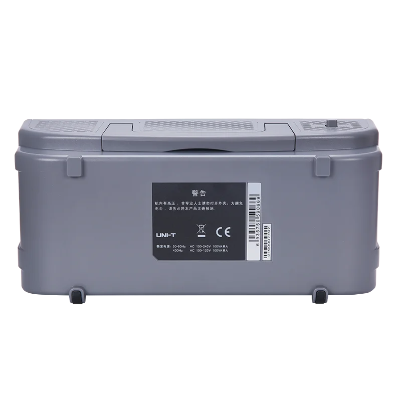 UNI-T UTD2052CL+ 50MHz Dual-Channel Digital Oscilloscope Pakistan - a grey rectangular casing with a warning label, power specifications, and a barcode.