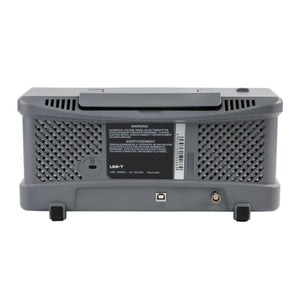 UNI-T UTD2202CEX+ 200 MHz 2-Channel Digital Storage Oscilloscope – 1.0 GSa/s, 64 kpts - a grey rectangular housing with ventilation grilles, a USB port, a BNC connector, and a warning label.