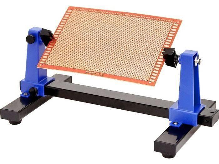 Universal PCB Stand Holder ZD-11E - a black metal base with two blue adjustable uprights holding a rectangular perforated circuit board.