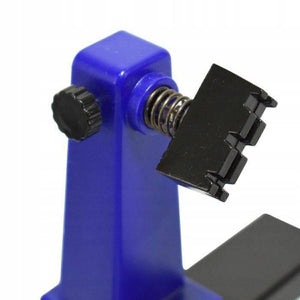 Universal PCB Stand Holder ZD-11E - a close-up of the blue vertical support arm featuring a spring-loaded black metal clamp and a side adjustment knob.