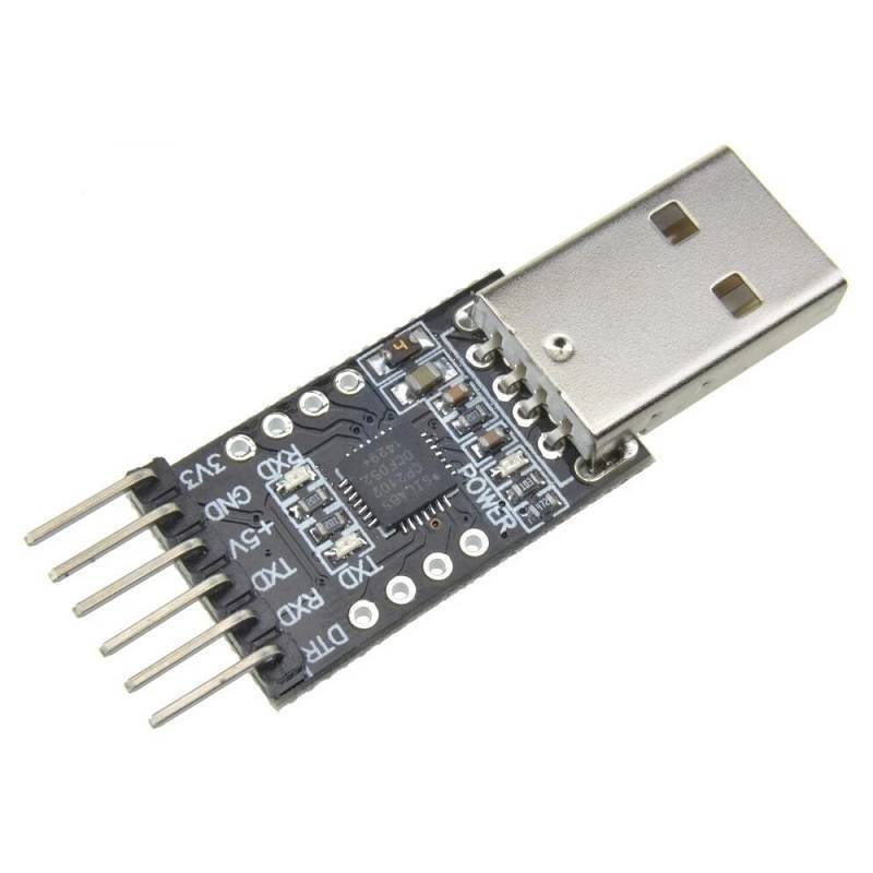 USB 2.0 To TTL UART Serial Converter CP2102 - a black circuit board with a USB connector, a six-pin header, and printed labels for pins and power.