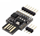 USB Digispark ATTINY85 Developing Board - shown as a black circuit board with a USB connector, pin headers, and labeled ports P0-P5, 5V, GND, and VIN.