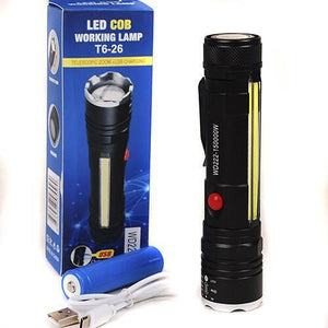 USB Rechargeable Zoomable LED Flashlight Camping Torch Lamp T6-26 USB Charge - with its blue packaging box, a blue cylindrical battery, and a white USB charging cable.