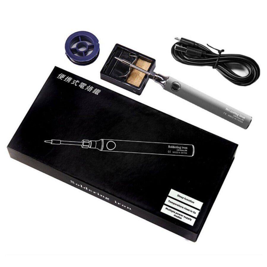 USB Soldering Iron Portable 8W Type C price - shown with its black packaging box, a metal stand with sponge, a spool of solder wire, and a USB charging cable.
