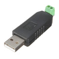 USB To RS485 Converter - a black plastic housing with a USB-A connector on one end and a green two-pin screw terminal block on the other.