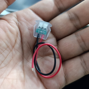 USB Type-C Oval LED Female Socket with Wires for Arduino Pakistan - a small clear plastic component with a circuit board, red and black wires.