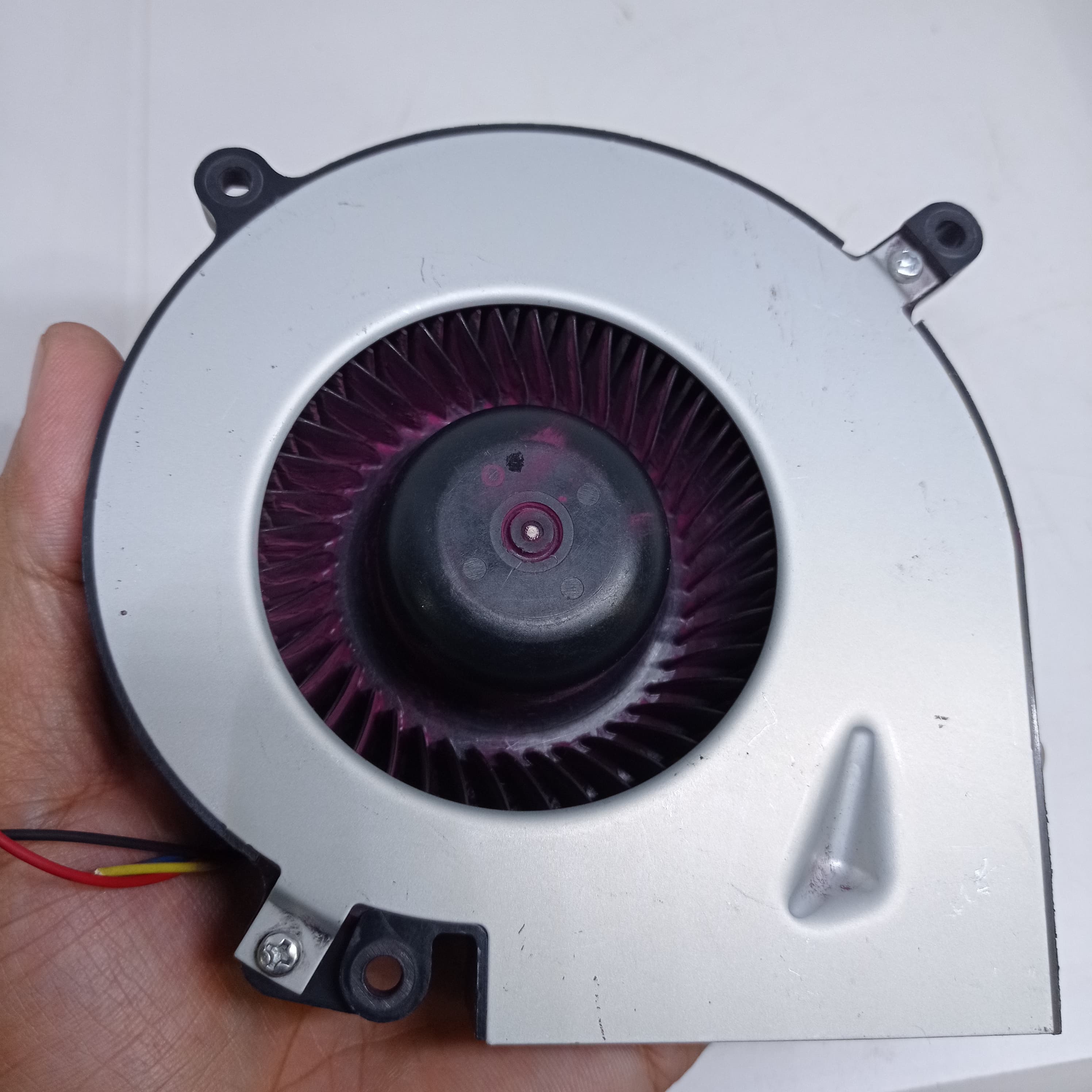 Used 24V 125mm x 125mm x 33mm 24V Turbo Blower Fan Cooling Fan - shown as a silver-cased blower with a black internal fan held in a hand.