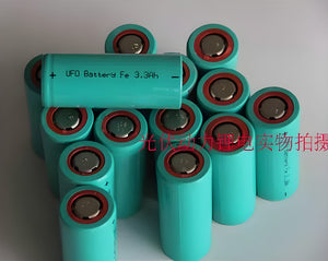 USED 26650 3.2V 3300mAh LiFePO4 Cylindrical Li-ion Batteries - shown as a pile of teal-coloured cylindrical cells with red rings around the top terminals.