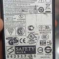 Used 32V Adapter Power Supply With 220V Power Cable - a rectangular black power brick showing a detailed technical specification label with HP branding and various safety symbols.