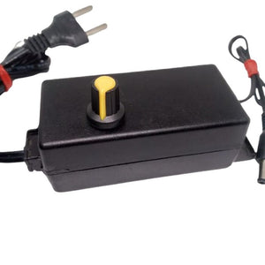 Used 3V-12V 2A Voltage Adjustable Switch Power Adapter 24W Adjustable Temperature Dimming Regulating Power Supply - with a yellow-topped rotary knob, input plug, and output connector.