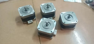 Used 4 Wire NEMA 17 5mm Shaft Bipolar Stepper Motors - shown as a group of four silver and black square motors with central shafts and white connectors.