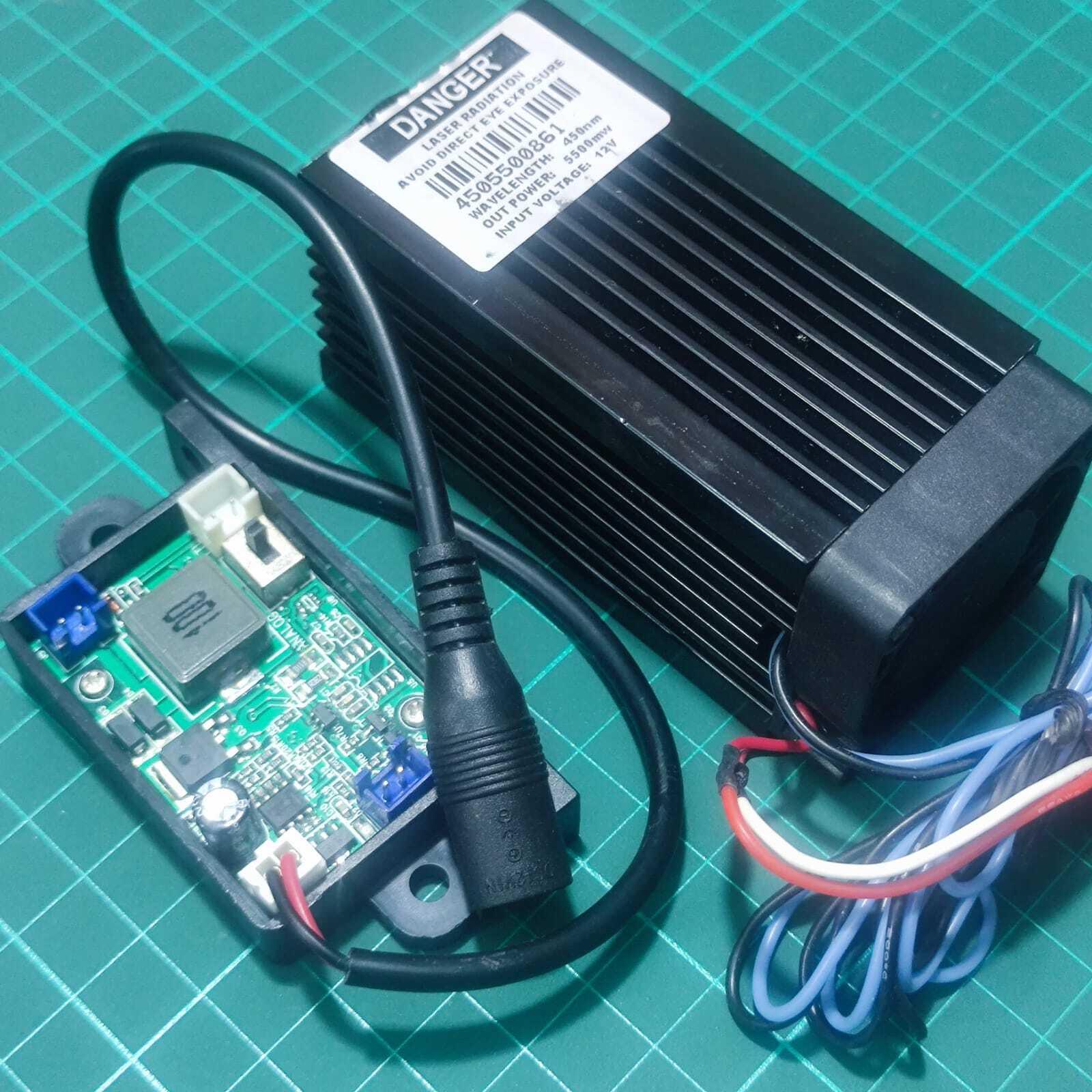 Used 5500mW Laser Module 450nm Blue Laser Head Engraving Cutting Laser Kit 5.5W Laser - a black laser module with a connected circuit board, DC power cable, and multi-colored wiring.