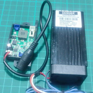 Used 5500mW Laser Module 450nm Blue Laser Head Engraving Cutting Laser Kit 5.5W Laser - a black laser head with a cooling fan and a green circuit board controller connected by a black cable.