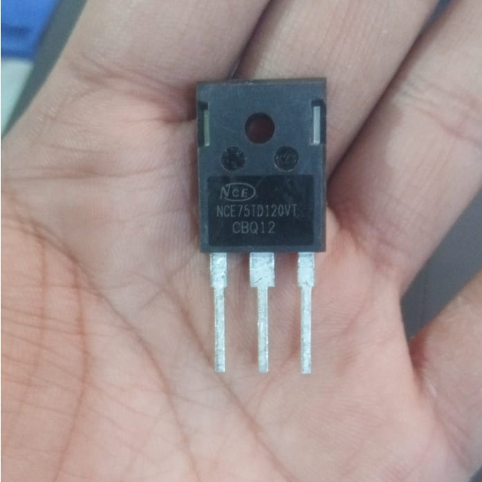 Used 75A 1200V IGBT NCE75TD120VT - a black, three-pin electronic component held in a hand, with the model number and NCE logo printed on its front surface.
