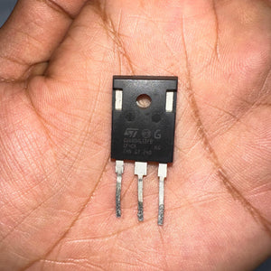 Used 80A 650V GWA80H65DFB (STGWA80H65DFB) – IGBT TO‑247-Digilog.pk - a black TO-247 electronic component with three metal pins, held in a person's palm.
