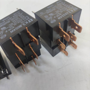 USED Fujitsu Japan JB024W 24V 20A Relay Switch High Current Relay POWER RELAY - two black rectangular power relays with copper-coloured electrical spade terminals.