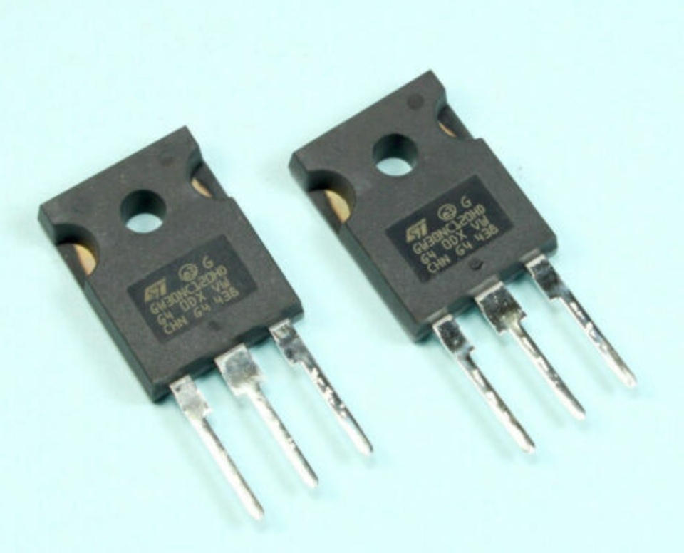 Used GW60H65 IGBT Power Transistor - two black three-pin electronic components with ST logos and GW30NC120HD markings on a light blue background.